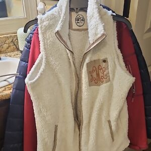 White Sherpa Vest by Wall Hanger